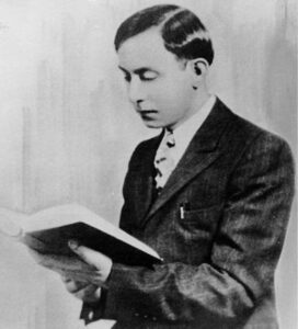 Master Fard Muhammad holding The Holy Qur'an
